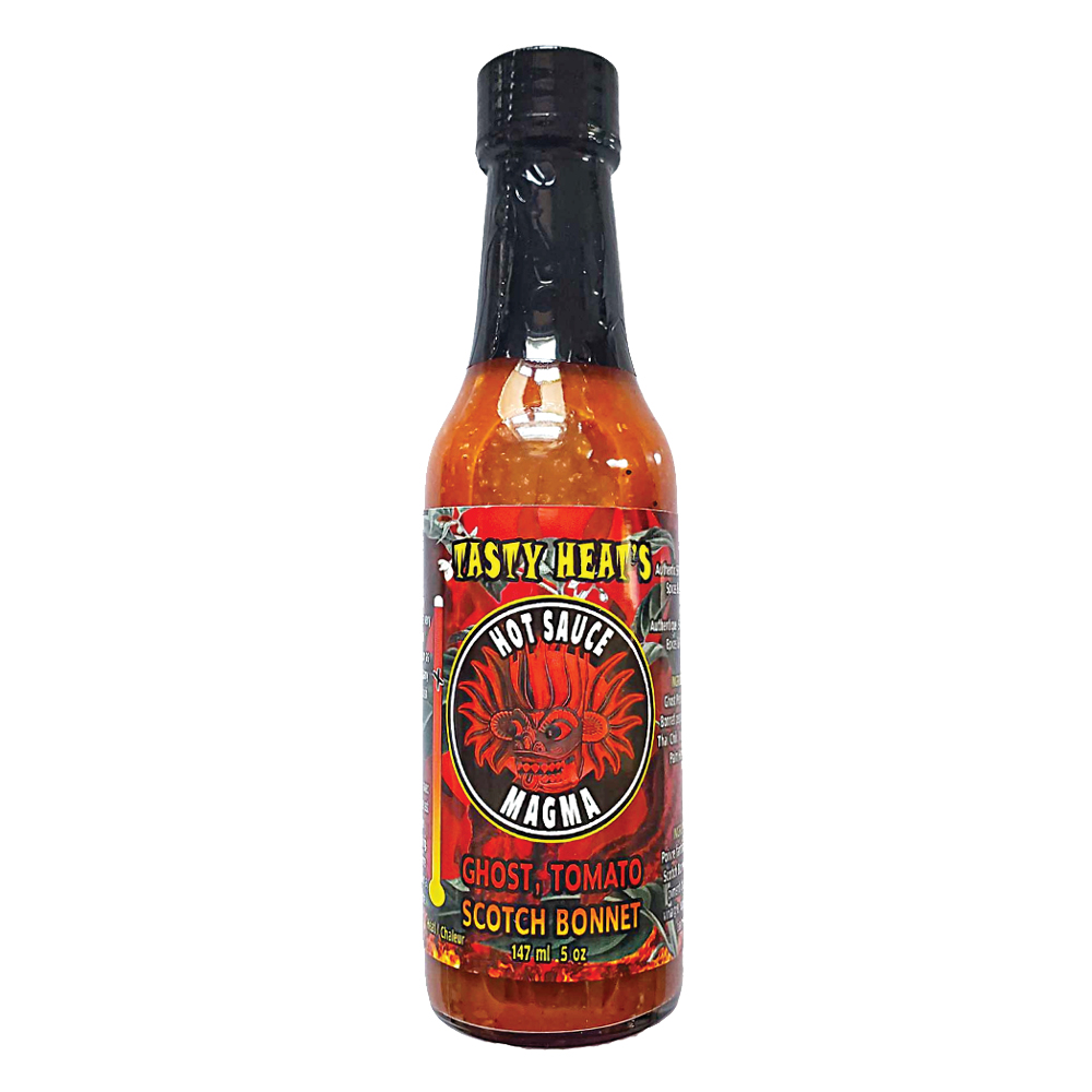 Bottle of red hot sauce with ghost tomato label 