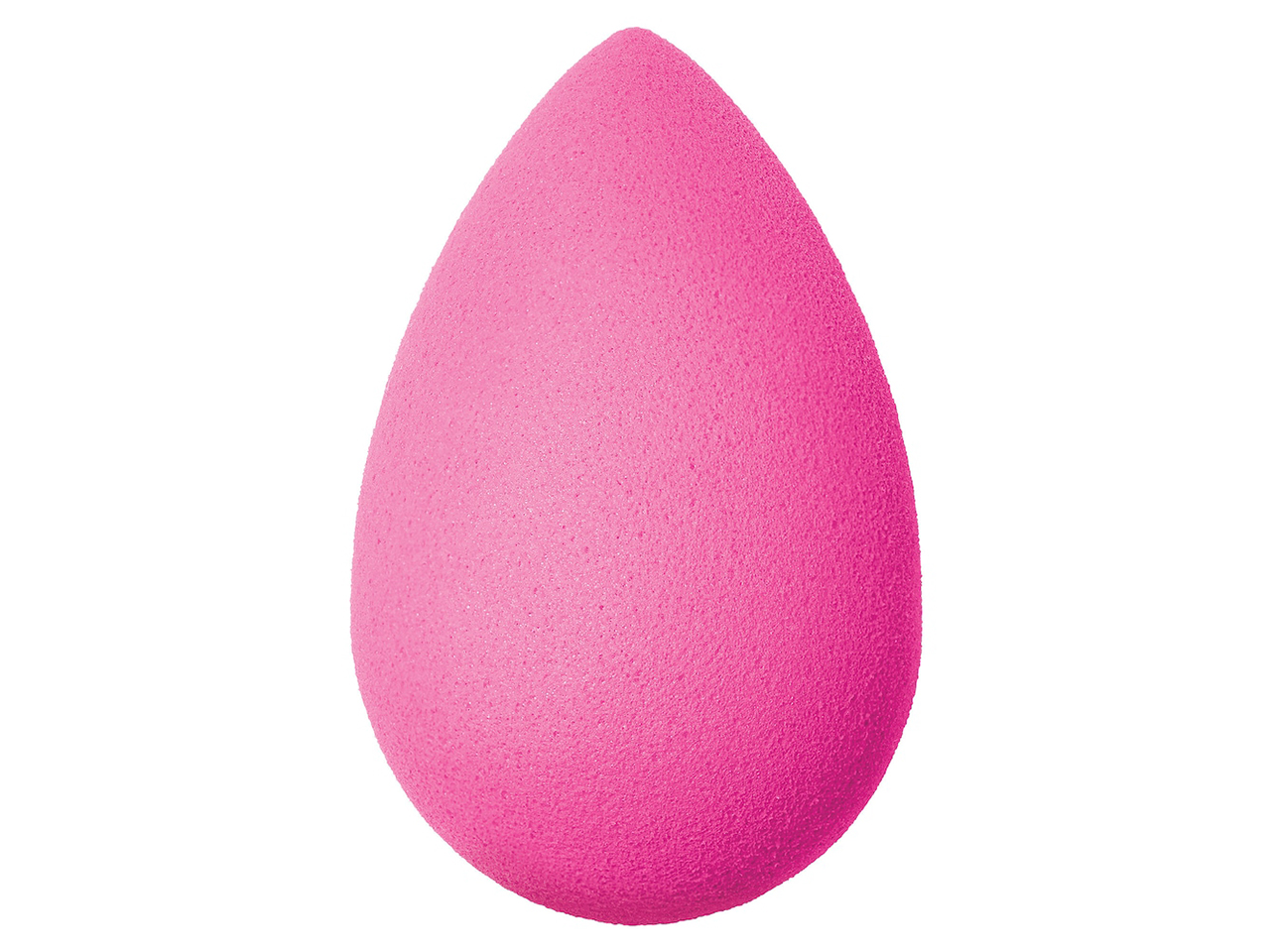 A pink Beauty Blender recommended by makeup artists for how to apply highlighter. 