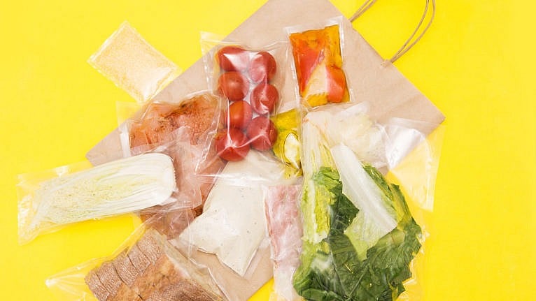 packaged ingredients for a meal kit salad