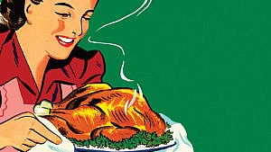 a woman with an apron holding a roast turkey