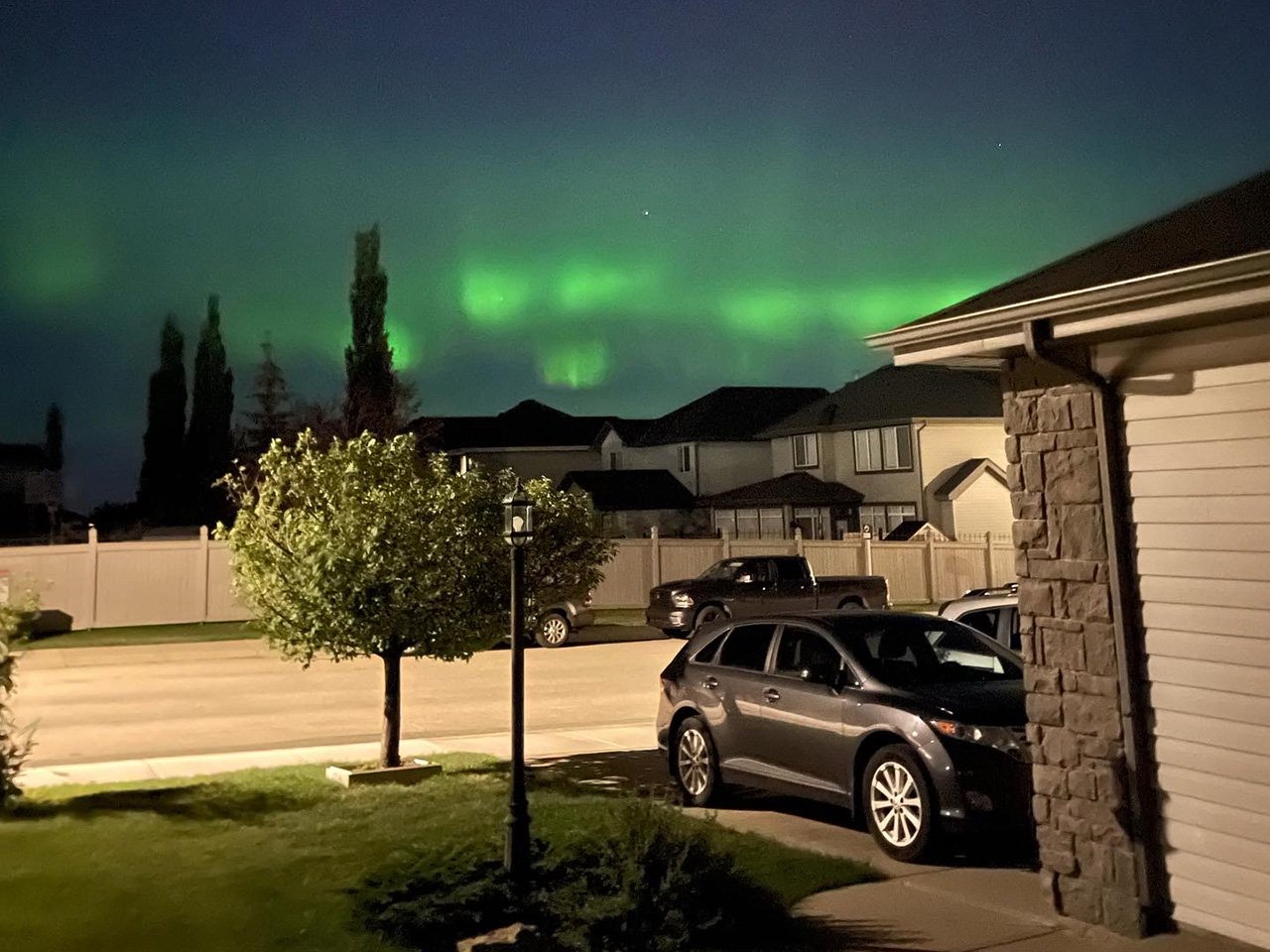 The Northern Lights, visible from Strapagiel’s new neighbourhood in Calgary
