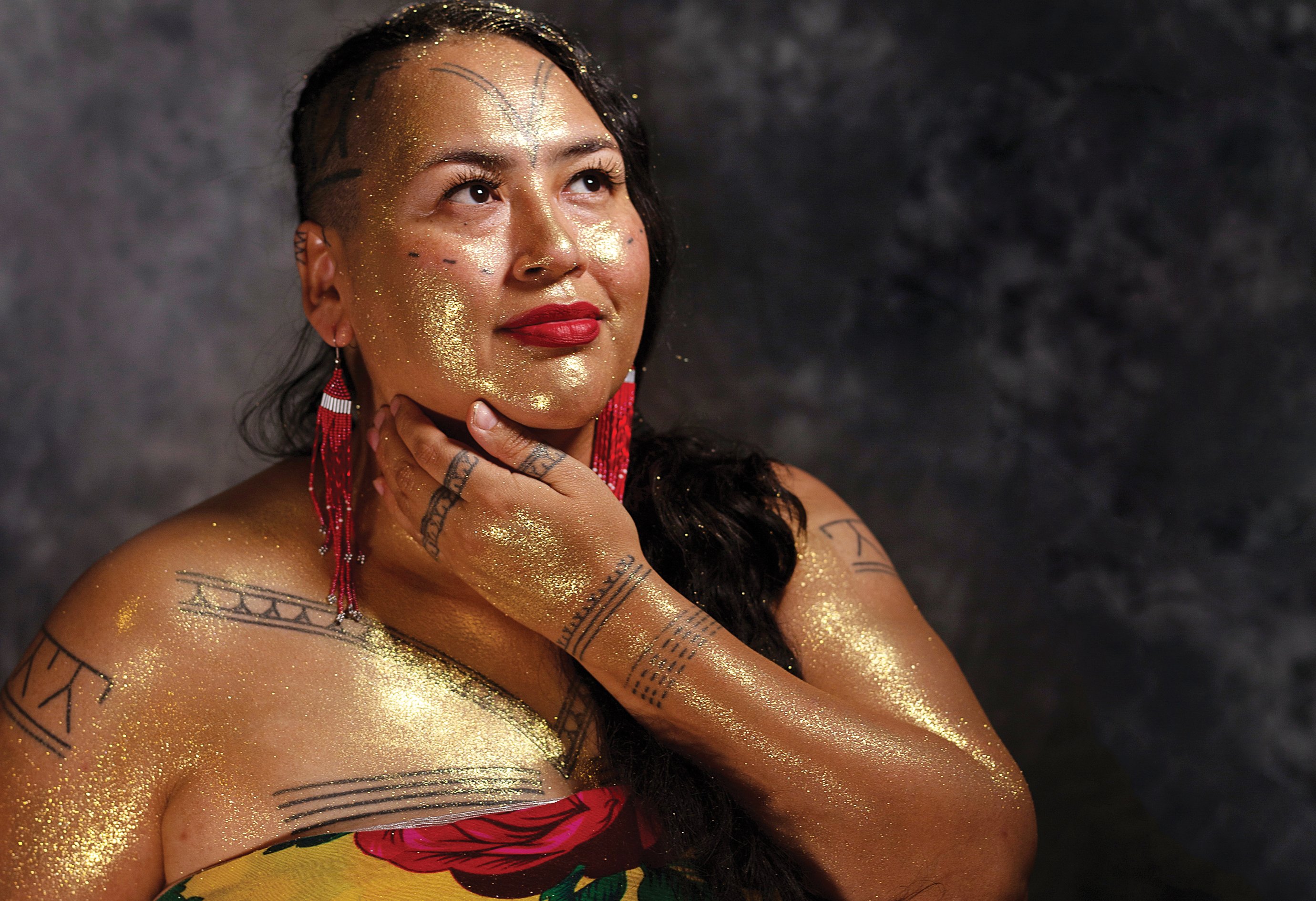 Hovak Johnston shows off her tunniit and kakiniit. Johnston learned traditional tattooing methods in an effort to reclaim the once outlawed practice.