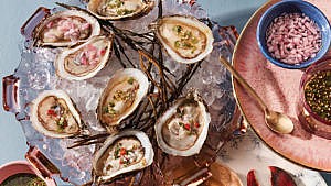 Seafood tower: oysters served with classic mignonette, ponzu-ish mignonette, and chimichurri mignonette