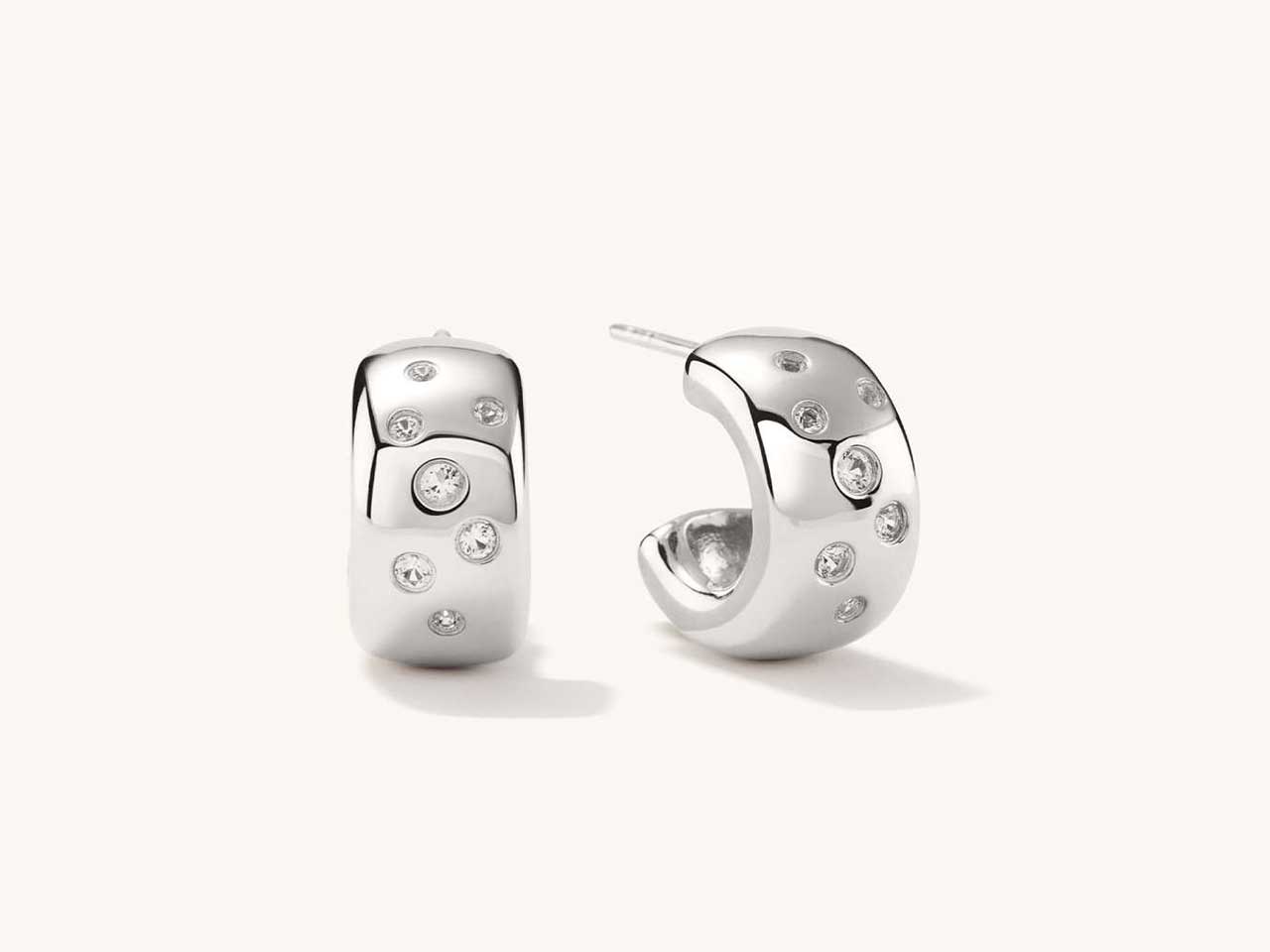A silver jewellery pair of earrings from Canadian brand Mejuri.