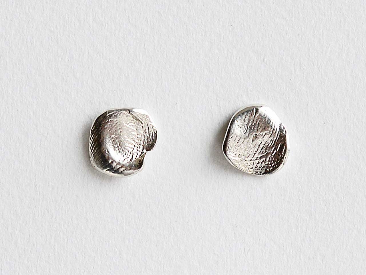 A silver jewellery pair of stud earrings from Canadian brand Michelle Ross.