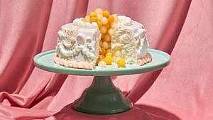 Colleen angel cake served on a seafoam-coloured cake dish