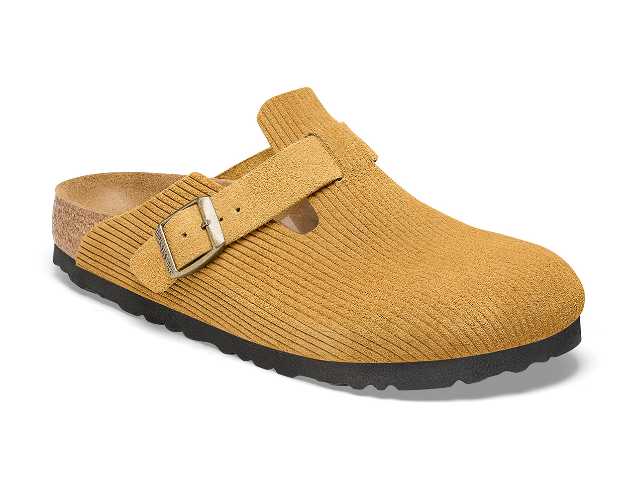A side profile of yellow corduroy clogs from Birkenstock.