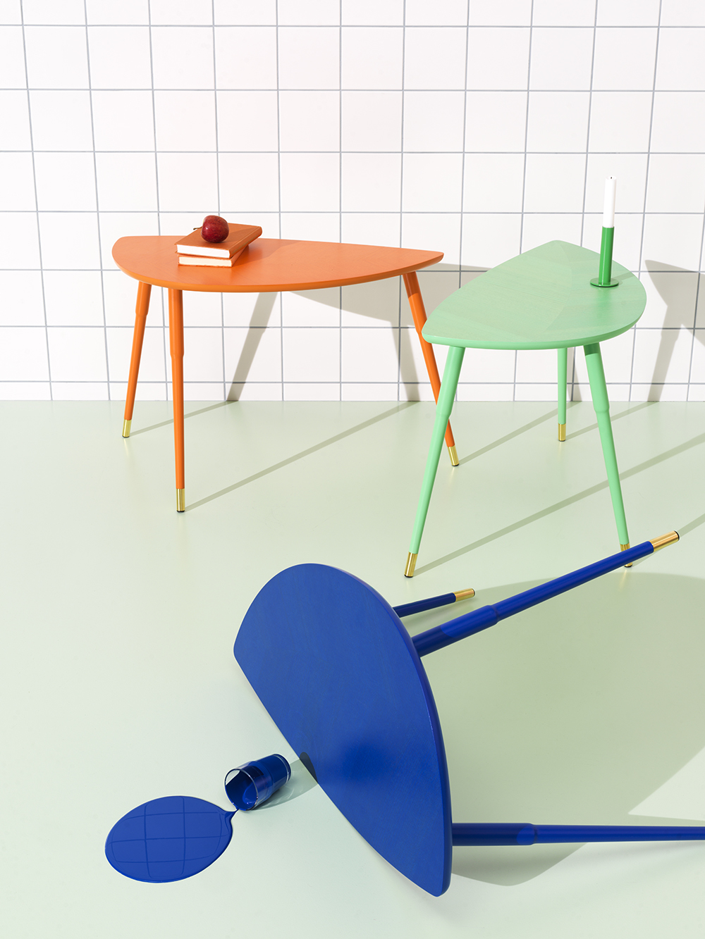 Three colourful Loevbacken side tables from the Ikea Nytillverkad collection.