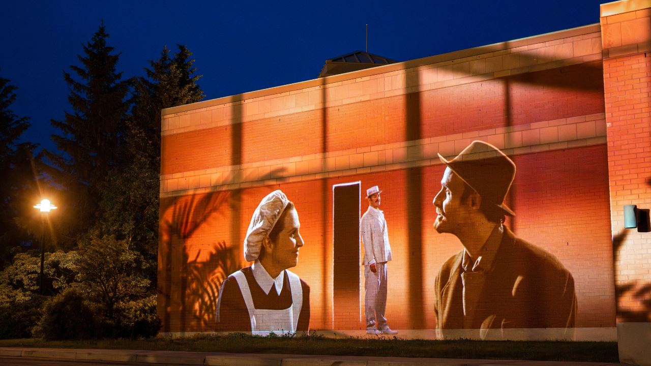 A projection on a building as par of the Cité Mémoire Charlevoix art piece