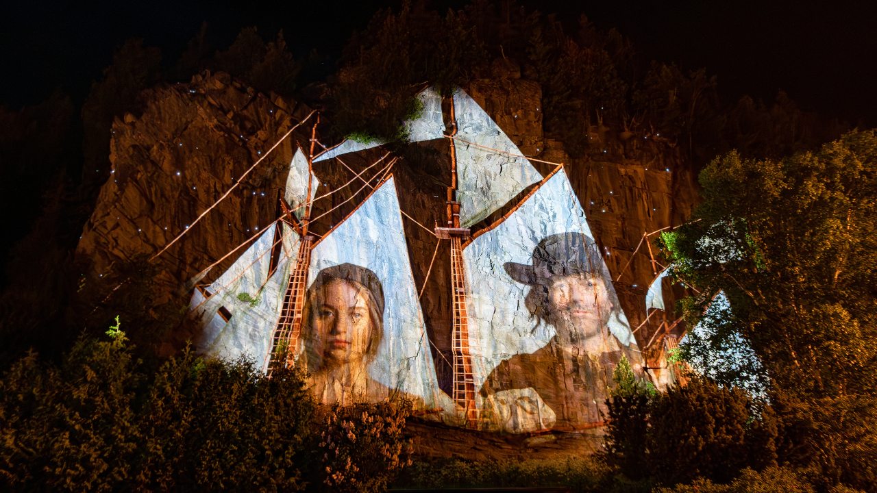 Images projected on a rock as part of the Cité Mémoire Charlevoix exhibit