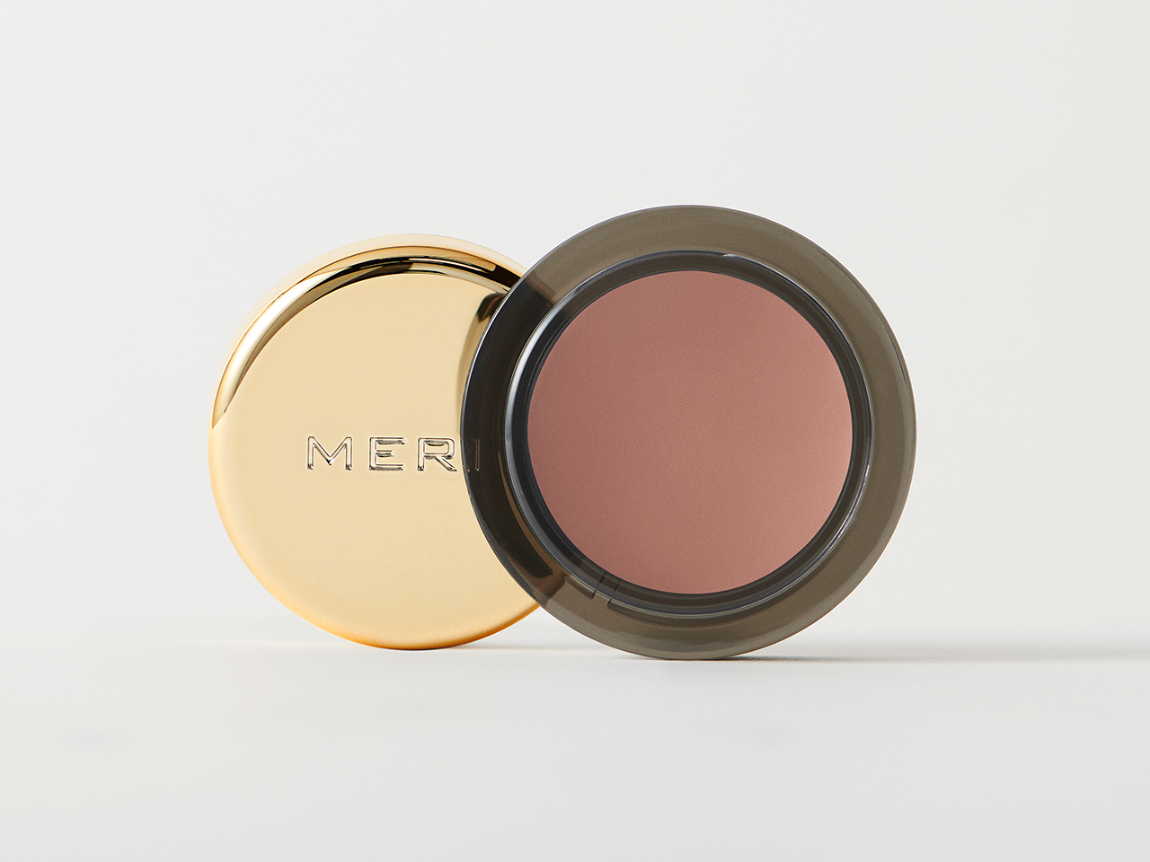 Merit Solo Shadow matte eyeshadow in Studio, a cool-taupe