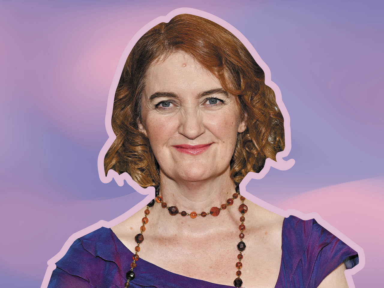 Author Emma Donoghue wearing a purple dress and necklace on a purple background