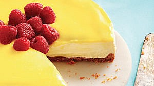 Lemon Mascarpone cheesecake with raspberries on top.