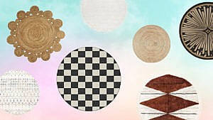 A group of round rugs of different colours and patterns on a pastel background.