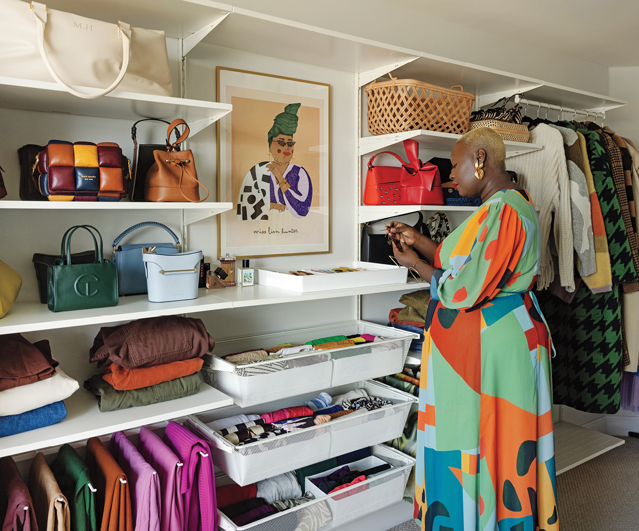 Musemo Handahu in her closet for a home tour of her maximalist decor Halifax rental.