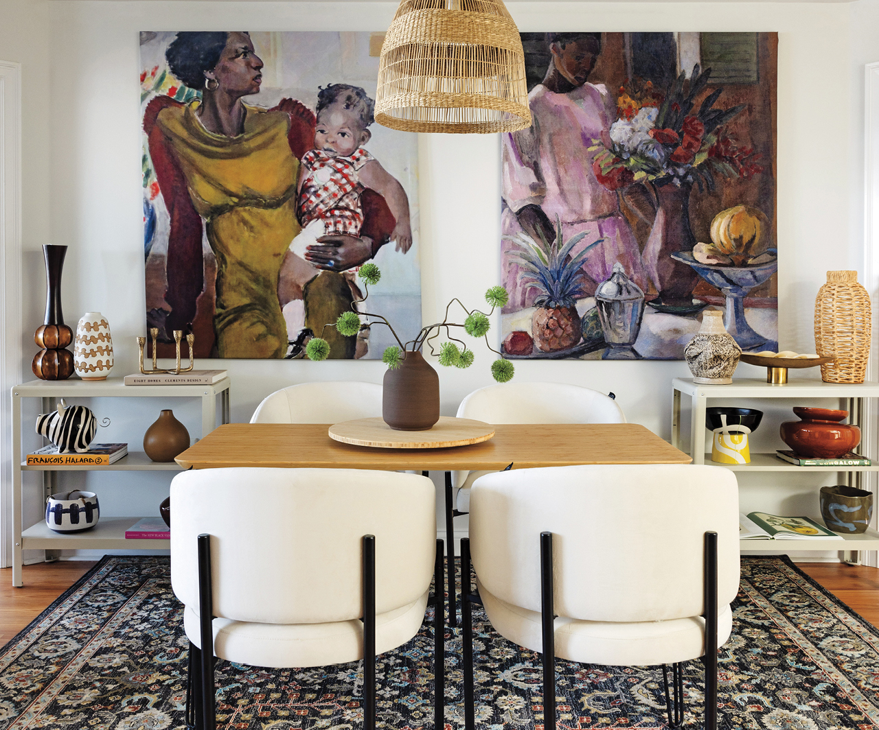A dining room filled with art in a maximalist decor of a Halifax rental.