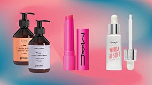 A selection of beauty products on ombré pink and blue background, best beauty products September 2023