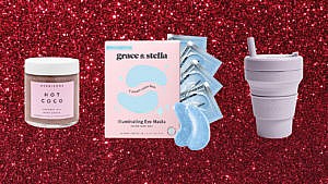 A jar of body scrub, eye masks and a collapsible travel mug on a red sparkly background, best stocking stuffer ideas