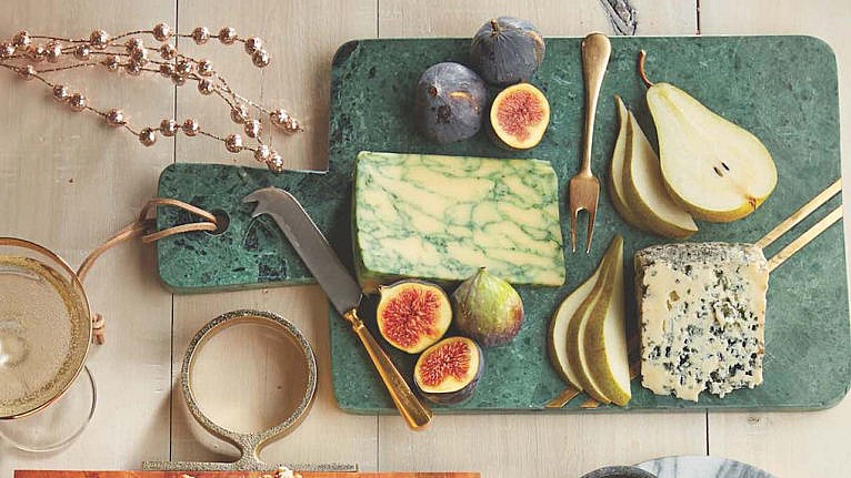 Holiday cheese board with blue cheese, sage derby cheese, beemster, figs, pears and honey, cheese board ideas
