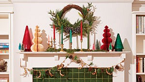 A mantel decorated for the holidays with colourful decor items to learn how to decorate a mantel for the holidays, Christmas mantel decor ideas
